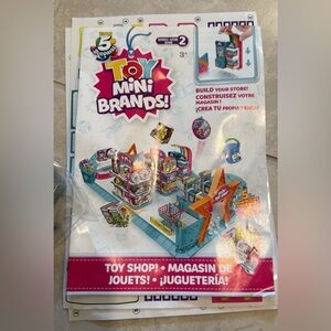 2 Mini Brands Shopping Centers with toys